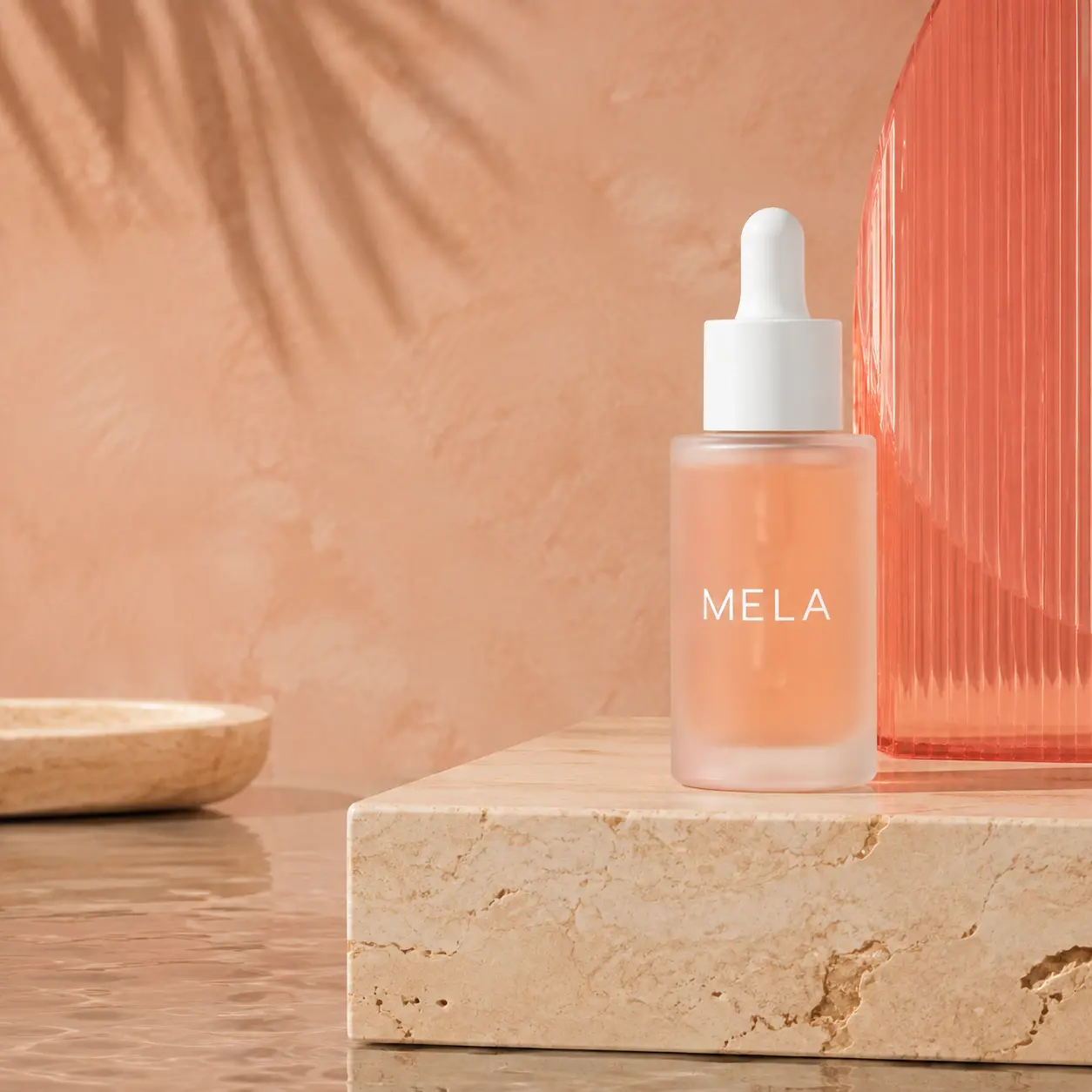 MELA peach serum bottle